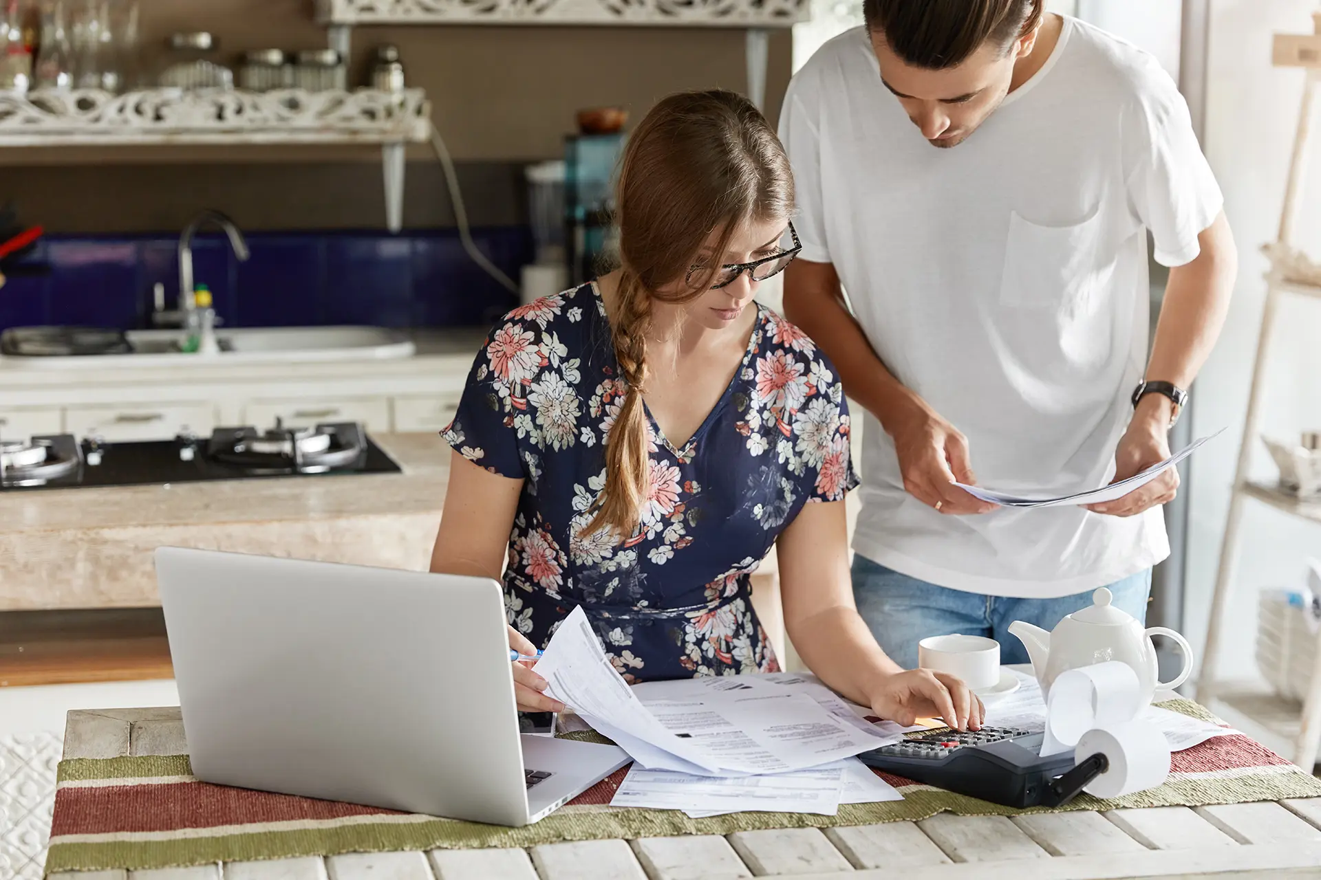 couple-managing-budget-together-kitchen
